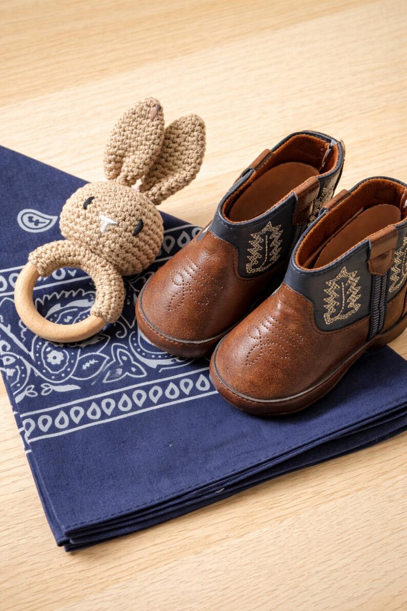 Texas themed baby gift, Wyoming themed baby gift, Montana themed baby gift, Oklahoma themed baby gift. baby cowboy boots gift, baby cowboy themed gift. baby western themed gift. western baby. Mexican baby, country baby keepsake, new baby gift boy. custom baby cowboy gift. custom baby gift. embroidered baby gift. baby cowboy boots. baby boots cowboy. hunting baby gift. fishing baby gift. fishing enthusiast baby gift. country baby keepsake.