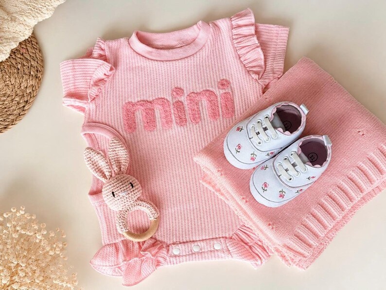 pink baby girl gifts. pink baby blanket. baby clothes. baby shoes sneakers. baby girl shoes. baby shower gift girl. baby announcement accessories. baby girl clothes gift set. baby girl ruffled romper gift. baby girl baby gift. princess baby gift. Chanel baby gift. embroidered baby shoes. floral baby gift