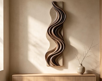 May include: A vertical wall sculpture featuring a series of deep, flowing, dark brown wooden waves mounted on a rectangular beige panel. The piece displays a rhythmic, undulating pattern that creates a sense of movement and depth on the surface.