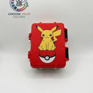 May include: A red case with a yellow Pikachu design sitting on a Poke Ball. The case has white and black clasps and hinges. The text "CHOOSE YOUR COLORS" is in the upper left corner, with a colour wheel logo.