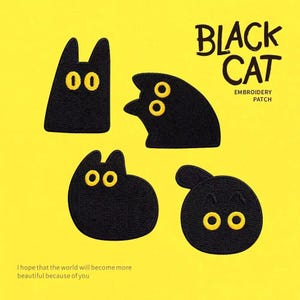 Puede incluir: Cuatro parches bordados de gatos negros con ojos amarillos en varias formas. El texto dice BLACK CAT EMBROIDERY PATCH y I hope that the world will become more beautiful because of you. Los parches están dispuestos sobre un fondo amarillo.