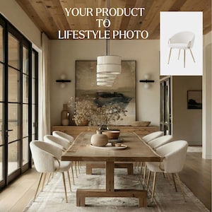 May include: A dining room scene with a large wooden table and eight white upholstered chairs with gold legs. The room has a neutral colour palette, a large painting, and a modern chandelier.