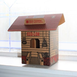 Casa de cartón vintage para pájaros ideal como envoltorio para regalos