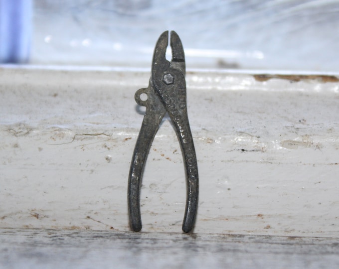 Vintage Metal Cracker Jack Toy Gries Reproducer Intercast Pliers