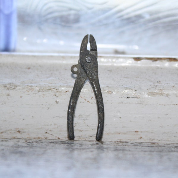 Vintage Metal Cracker Jack Toy Gries Reproducer Intercast Pliers