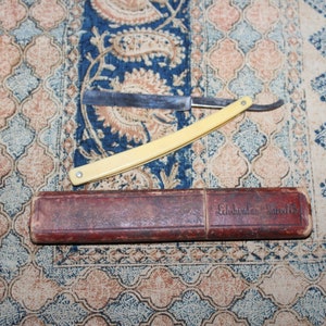 Antique Straight Razor Bowdin Wedge Yellow Handle