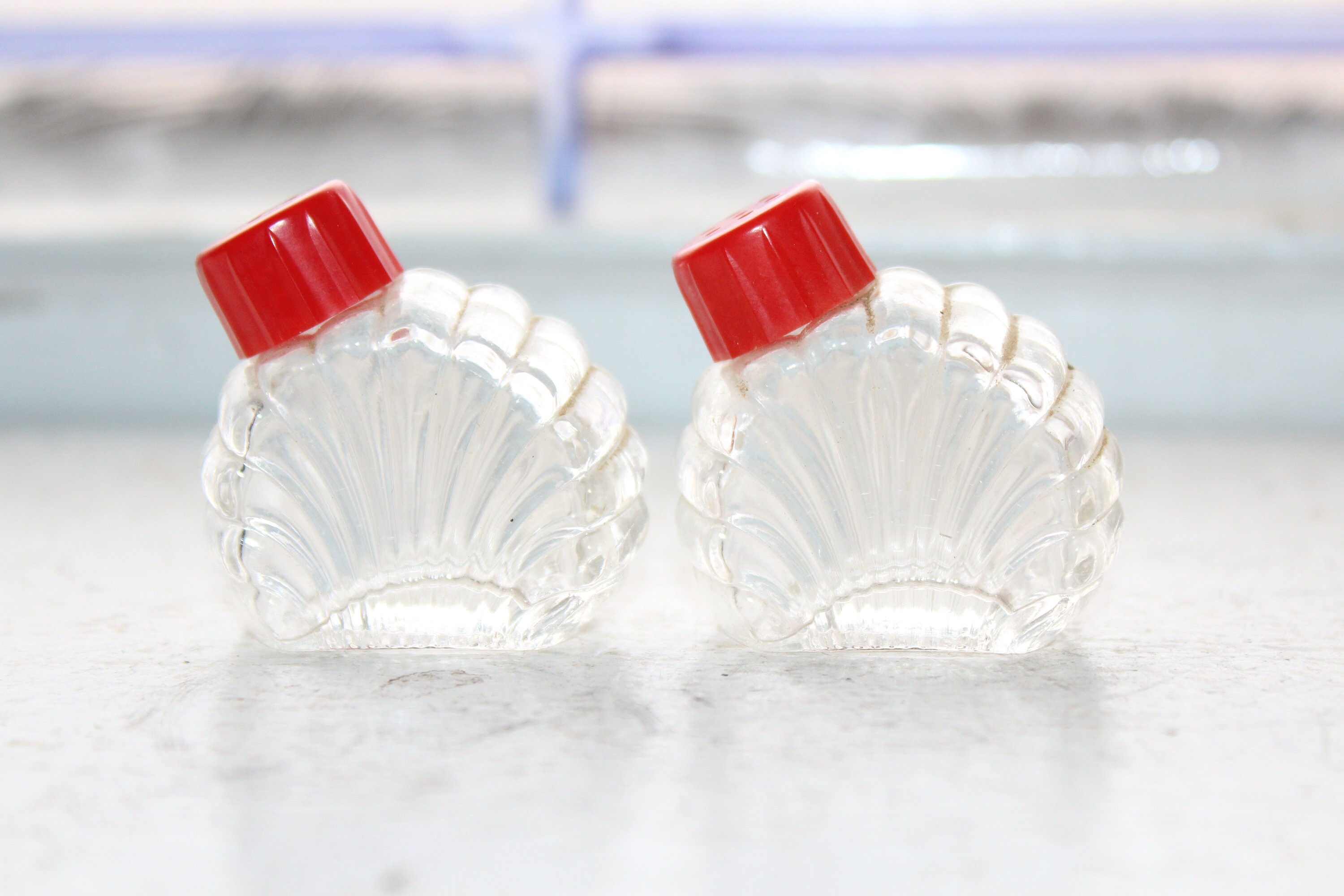 Vintage Glass Salt and Pepper Shakers with Red Lids