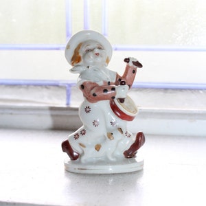 Figurina del piccolo tamburino del Giappone occupato