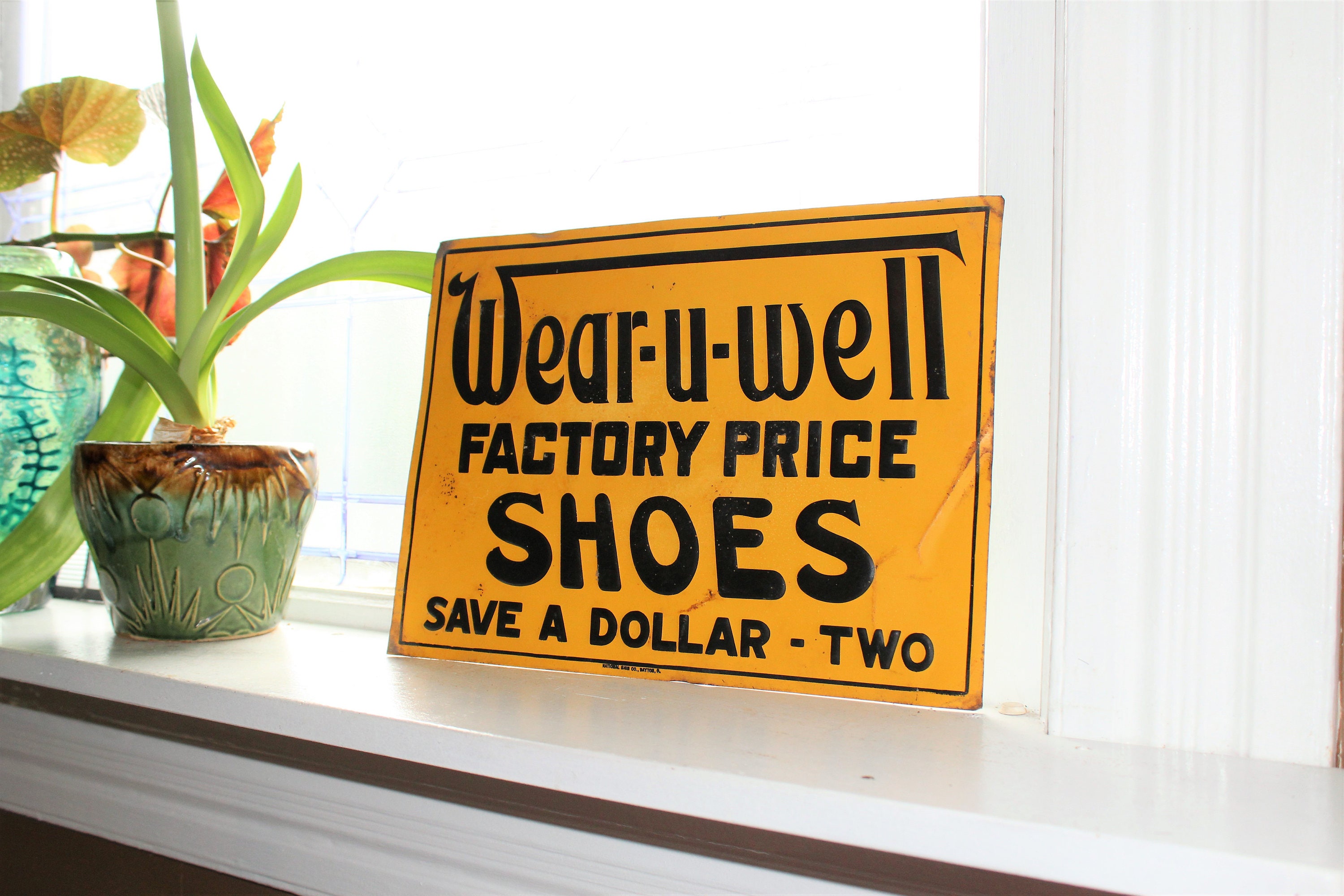 Antique Wear U Well Shoes Tin Sign