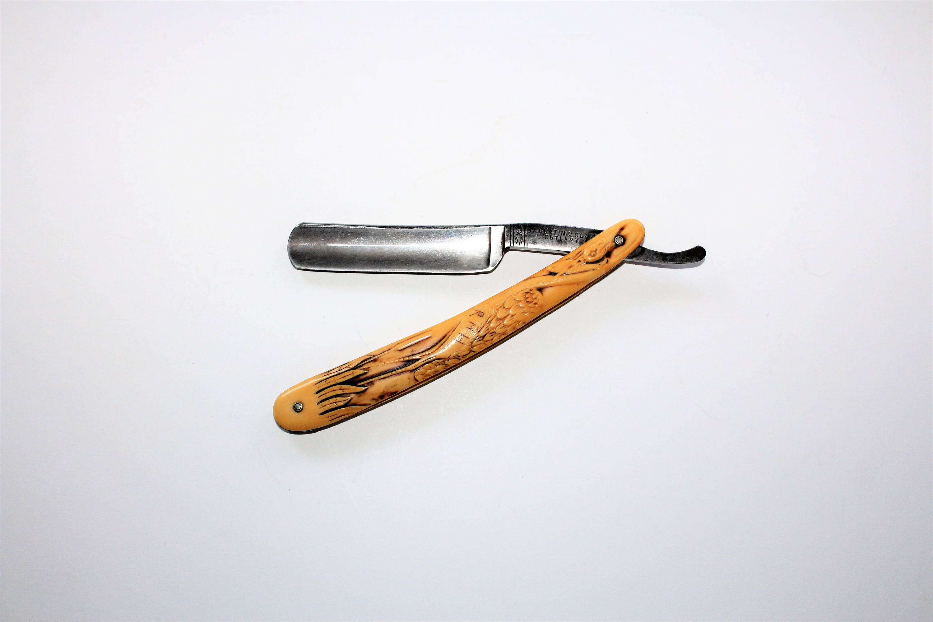 Antique Straight Razor Curtin & Clark with Carved Heron Bird Handle