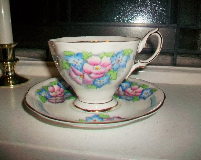 Royal Albert Tea Cup and Saucer Pink and Blue Flowers Gold Trim Vintage 1950s Hand Painted