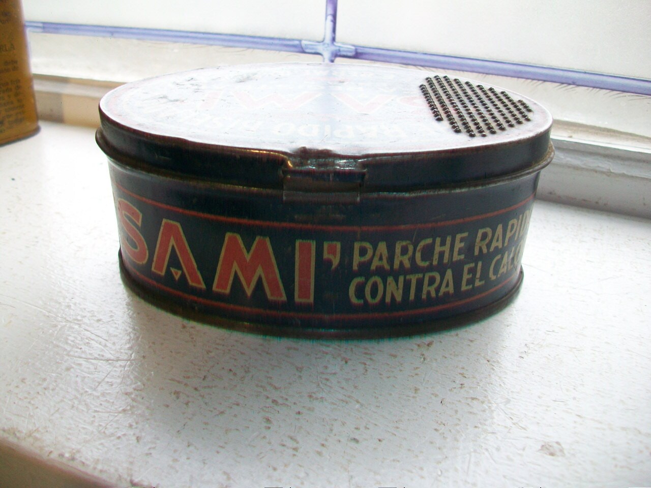 Antique Tire Patch Tin Spanish Sami Tin