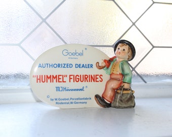 Plaque originale du marchand de figurines Goebel Hummel, vers 1982