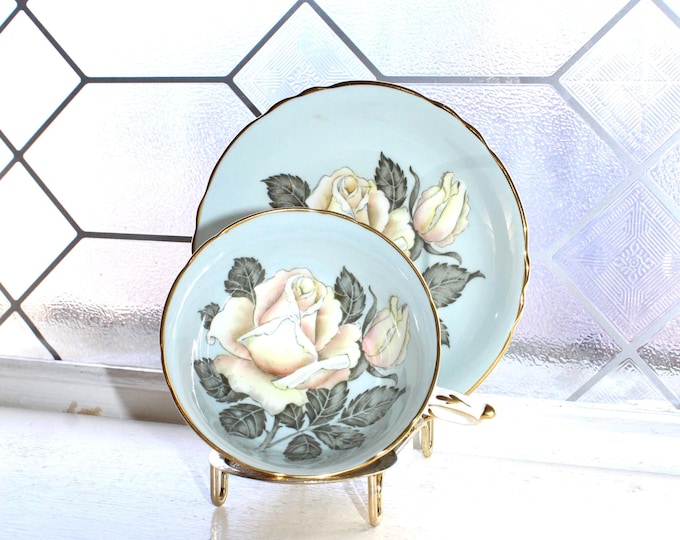 Paragon Tea Cup and Saucer Large Rose on Pale Blue