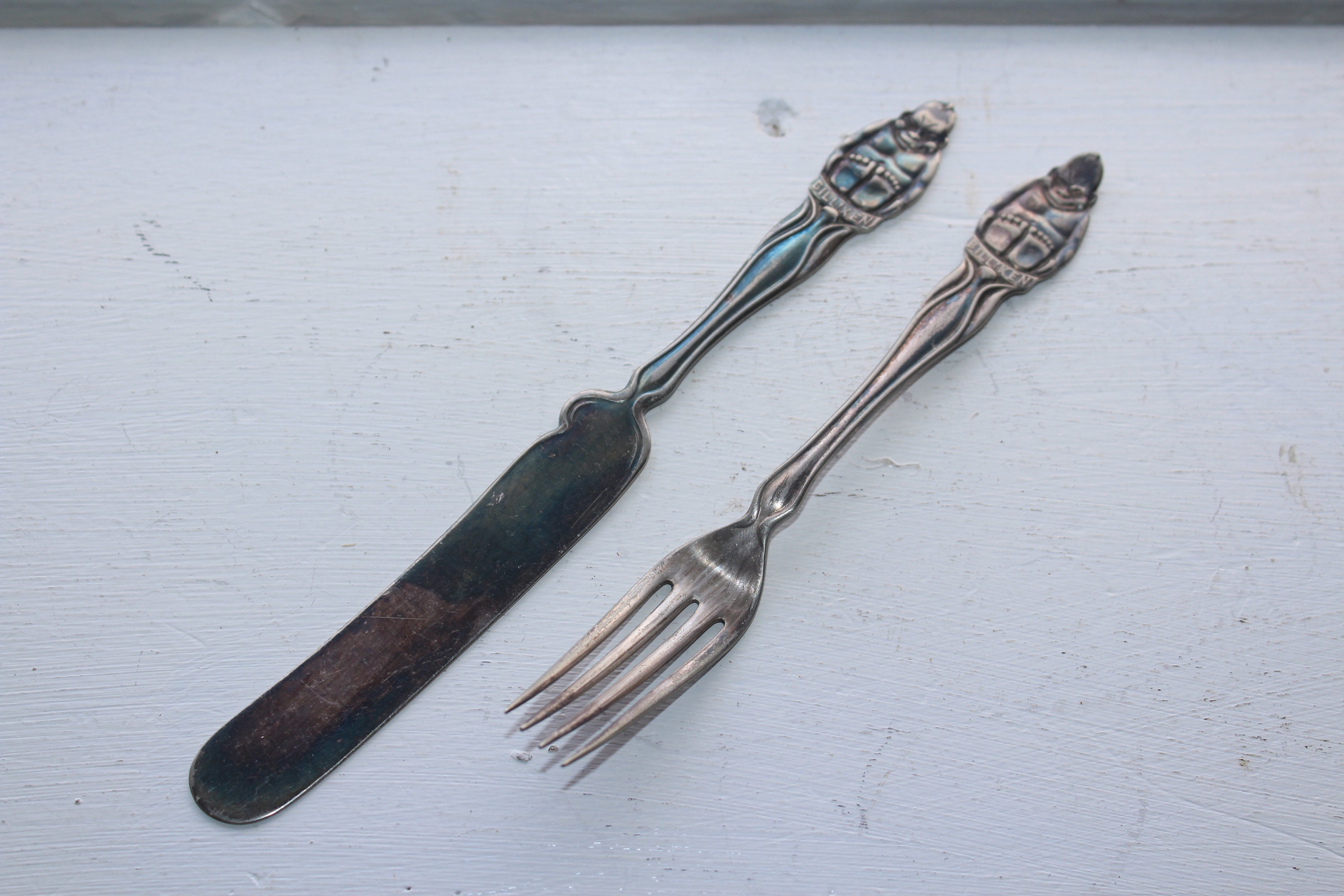 Antique Billiken Knife and Fork by Queen City Silver Co