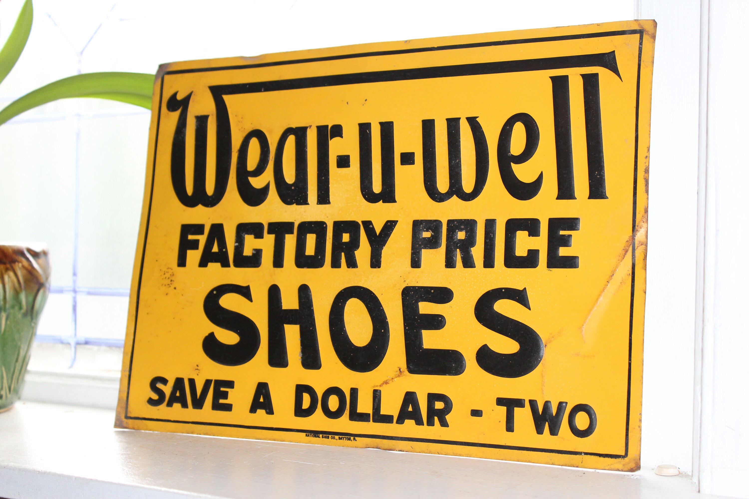 Antique Wear U Well Shoes Tin Sign