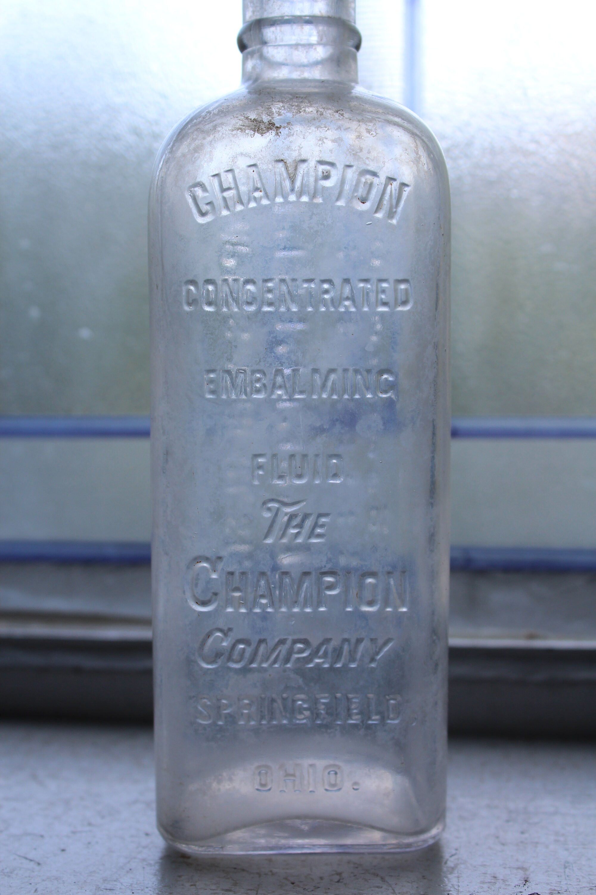 Antique Champion Embalming Fluid Bottle