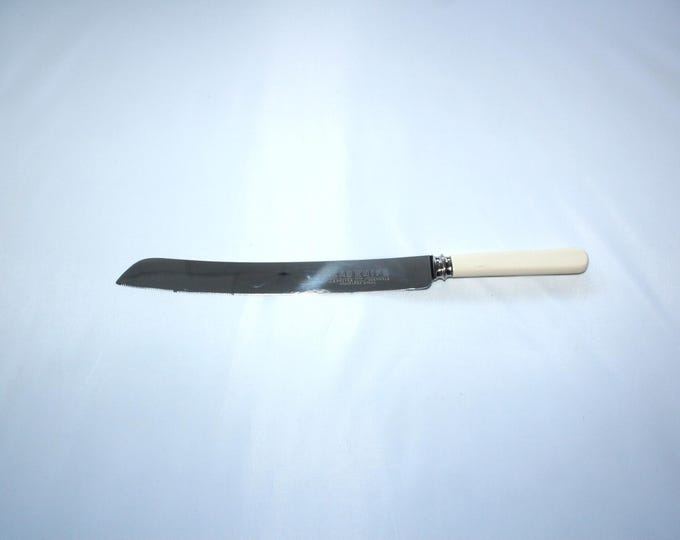 Antique Bread Knife J H Potter Sheffield England with Catalin Handle