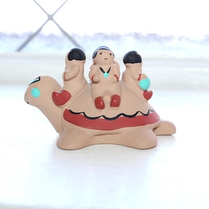 May include: A set of three ceramic mugs with a speckled, matte finish. The mugs are in shades of cream, light gray, and dark gray. Each mug has a simple, minimalist design, perfect for coffee or tea.