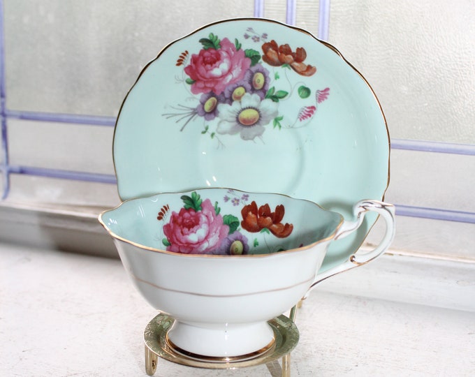Paragon Tea Cup and Saucer Flowers on Pastel Blue 1950s