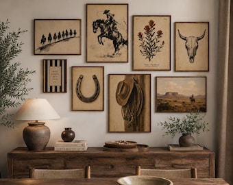May include: A gallery wall arrangement featuring eight framed prints with western themes, including a cowboy on horseback, a horseshoe, a skull, and a hat with rope. The prints are displayed above a wooden sideboard with a lamp and decor.