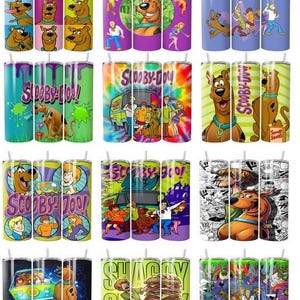 May include: A collection of twelve cylindrical tumblers featuring various Scooby-Doo character graphics, including Scooby-Doo, Shaggy, Velma, Daphne, and Fred, alongside the Mystery Machine van, colorful patterns, and the text Scooby-Doo.