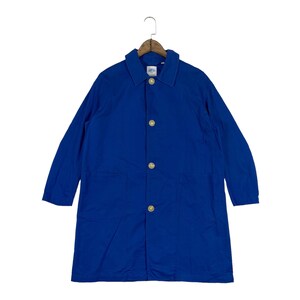 May include: A long-sleeved, royal blue work coat featuring a classic collar, a front button-down closure with four light-colored buttons, and two large patch pockets on the lower front. The coat is displayed on a wooden hanger against a white background.