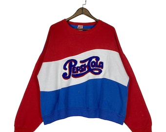 Vintage 80-tals Pepsi Cola-tröja med färgblock, rund hals, retro 1980-tals Pepsi America Apparel-tröja, stor, tillverkad i USA, mattbroderad logotyp