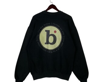 Bluza Burns Corporation z lat 90. w kolorze czarnym, z okrągłym dekoltem, wyprodukowana w USA, z grafiką, retro, odzież sportowa, rozmiar L