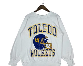 Bluza Toledo Rockets z lat 80., rozmiar S, wyprodukowana w USA | Kask futbolowy University of Toledo College, okrągły dekolt, biało-niebiesko-żółty | Rozmiar S
