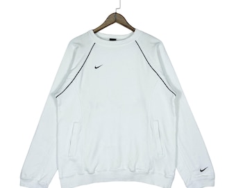 Sudadera Nike vintage de los 90 con cuello redondo y logo pequeño, color blanco / Talla M para hombre / Sudadera raglán con ribete central / Ropa deportiva retro Nike