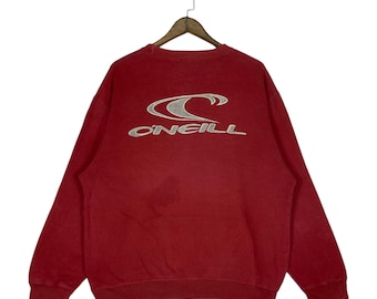 Bluza Vintage O'Neill w kolorze czerwonym | Bluza z okrągłym dekoltem w stylu surfingu i skate'a z lat 90. | Luźny, przetarty, wyblakły wzór z dużym haftowanym logo | Rozmiar L
