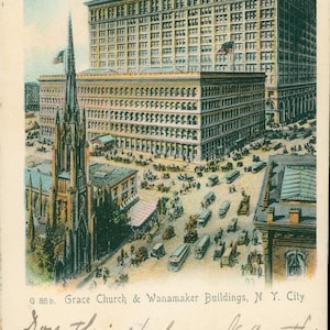 May include: A vintage postcard depicting Grace Church and the Wanamaker Buildings in New York City. The postcard features a detailed illustration of the buildings and the surrounding streets, with a church steeple in the foreground.