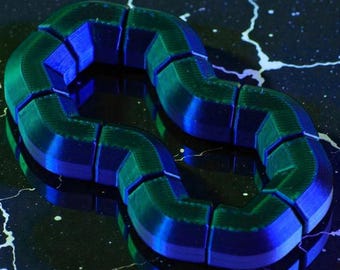 Fidget Toy The Wobble8 anti-stress game for Everyday Use at the Office and School/ in two-dimensional