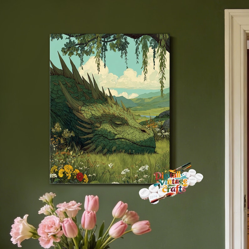 May include: A paint-by-numbers kit featuring a green dragon resting in a grassy meadow with wildflowers under a willow tree. The set includes a canvas print of the dragon, a collection of small numbered paint pots, and brushes for painting.