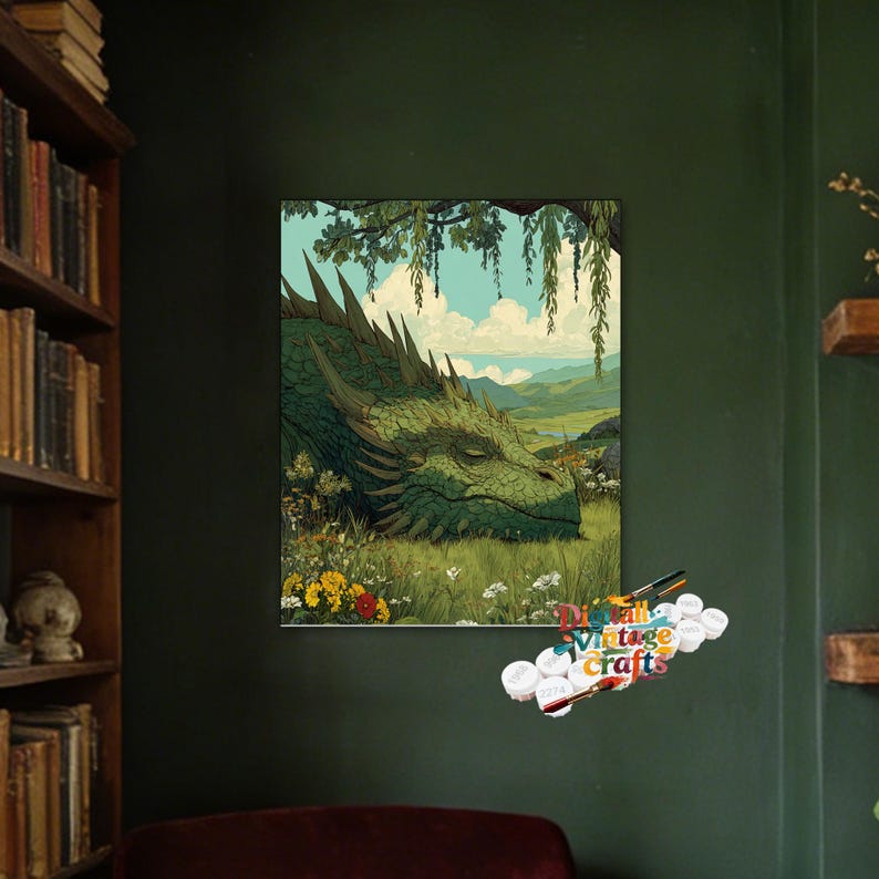 May include: A rectangular wall art print featuring a large green dragon resting in a grassy meadow filled with wildflowers under a willow tree. The scene includes distant mountains and a blue sky with clouds. The text Digital Vintage Crafts is visible.
