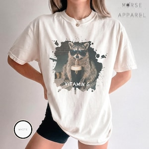 Funny Raccoon Drinking Beer Vitamin G T-Shirt, Comfort Colors® Guinness Tee, Pub Party Shirt, Unisex Trendy Meme Graphic Top White