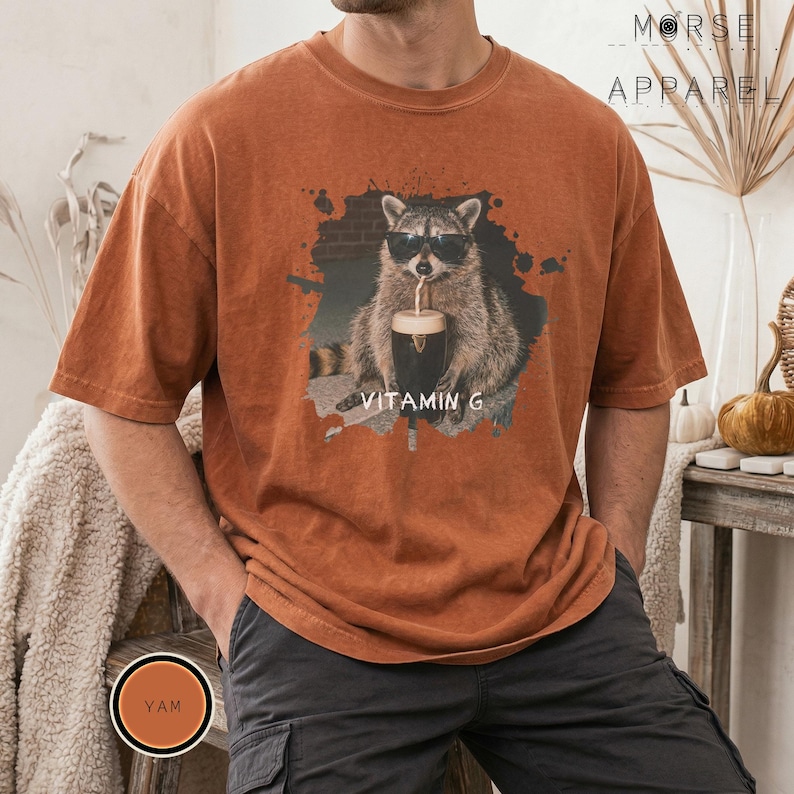 Funny Raccoon Drinking Beer Vitamin G T-Shirt, Comfort Colors® Guinness Tee, Pub Party Shirt, Unisex Trendy Meme Graphic Top Yam