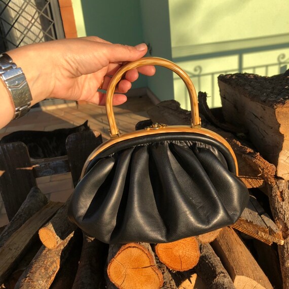 Leather puffy bag 1940s