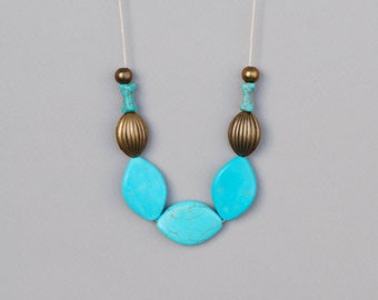 Howlite  statemen necklace in turquoise and antique brass with  adjustable length