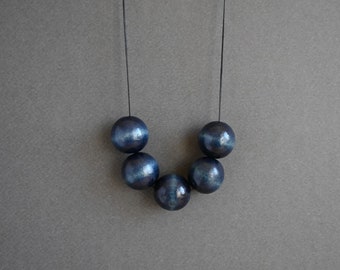 Deep blue long necklace with round wooden beads and adjustable length