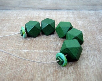 Dark green geometric necklace with wooden beads and adjustable length