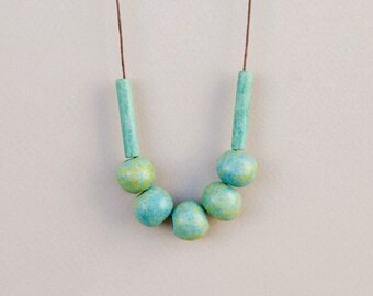 Light Moss Ceramic Necklace with round beads in mint tones and adjustable length