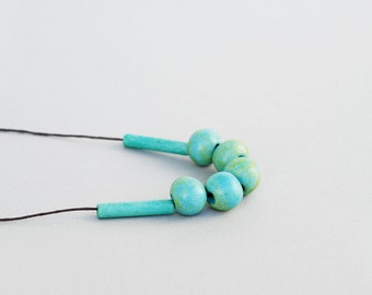 Light Moss Ceramic Necklace with round beads in mint tones and adjustable lenght