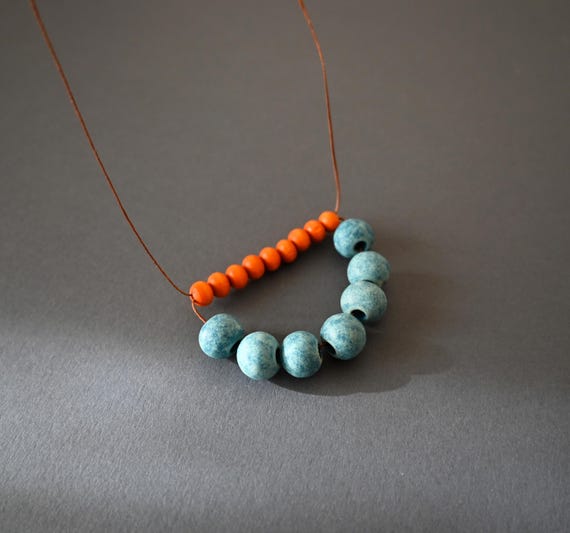 Ceramic necklace in blue and orange, Mixed bead necklace