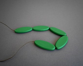 Green Ellipse long adjustable necklace with bold wooden beads