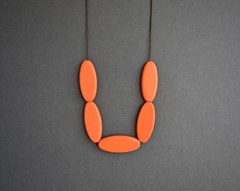 Orange necklace with bold ellipse beads, Chunky wooden necklace