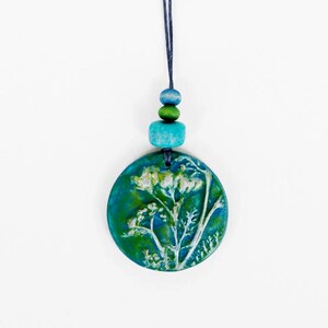 Teal nature necklace with botanical imprint from polymer clay, Handmade floral clay pendant