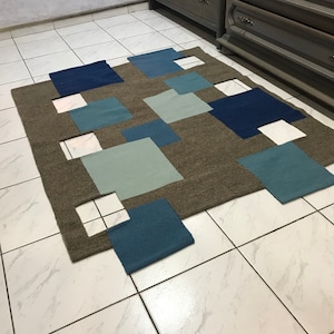 Modern handwoven wool carpet, Blue and beige handmade rug, Irregular shaped area rug, Unique carpet with holes