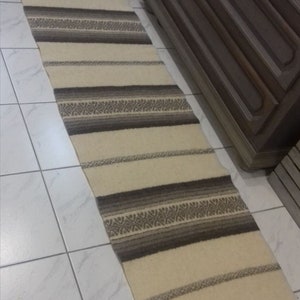 Bulgarian handwoven rug of natural undyed wool. Handmade ethnic kilim rug, traditional design.